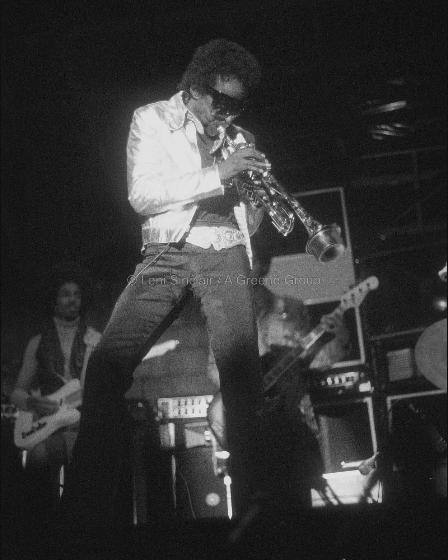 Miles Davis performing, photographed by Leni Sinclair